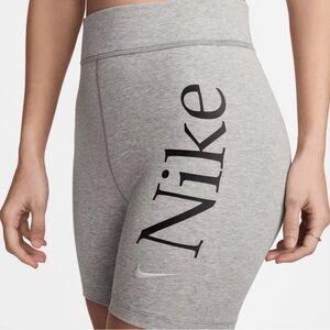 Nike woman’s grey sports shorts new with tag size S&M